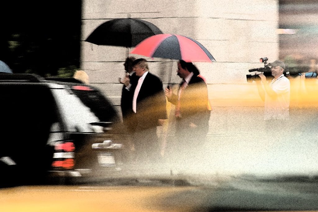 Trump with umbrella