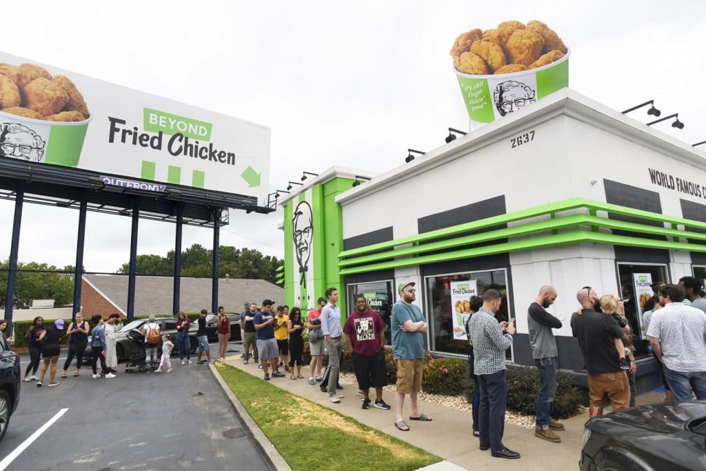 KFC people in ques to buy plant-based chicken
